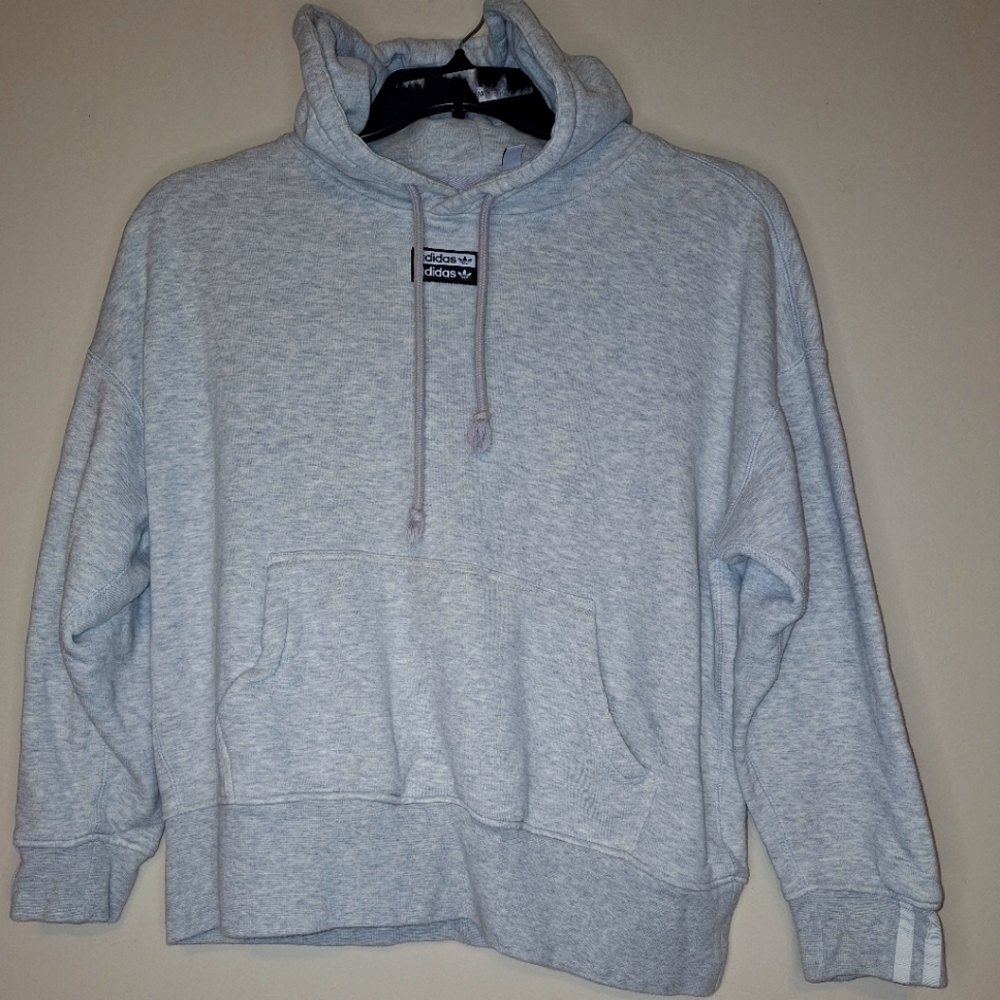 An Adidas hoodie in a mens size small. It's pre-loved and in great condition.